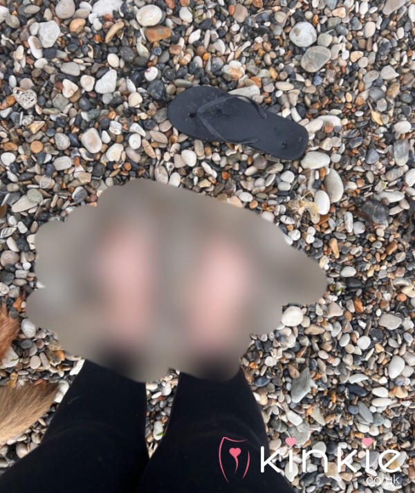 Beach Feet With White Painted Toes