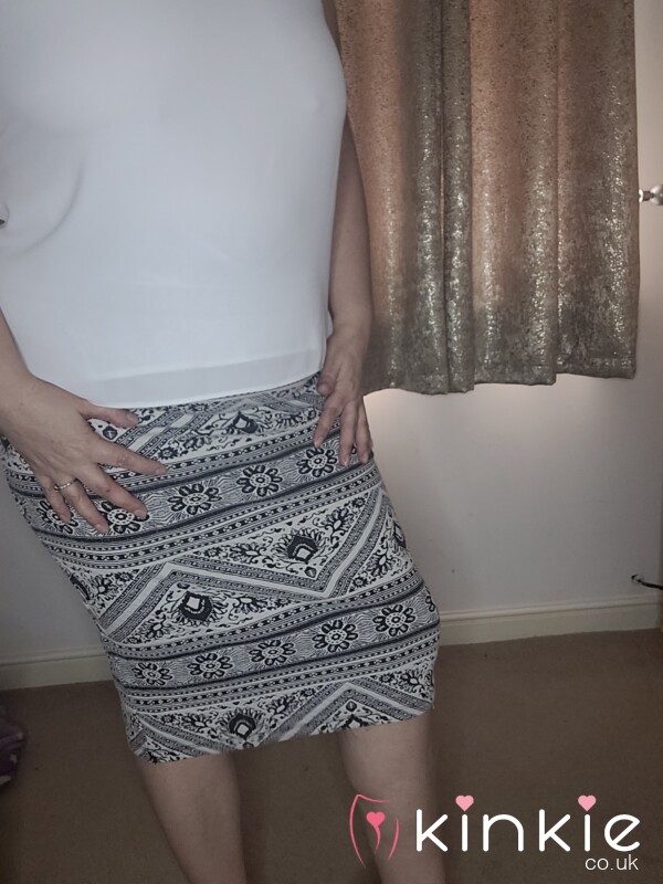 White Top And Pattern Skirt