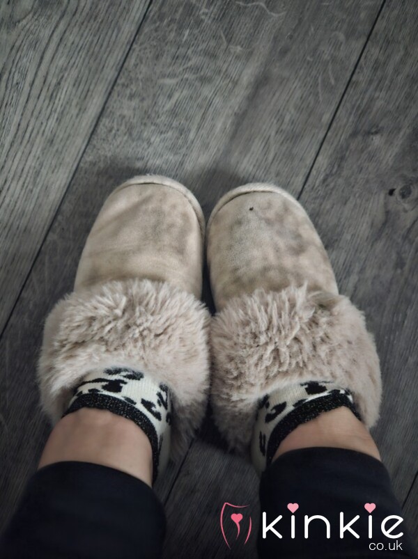 Worn Pink Fluffy Slippers